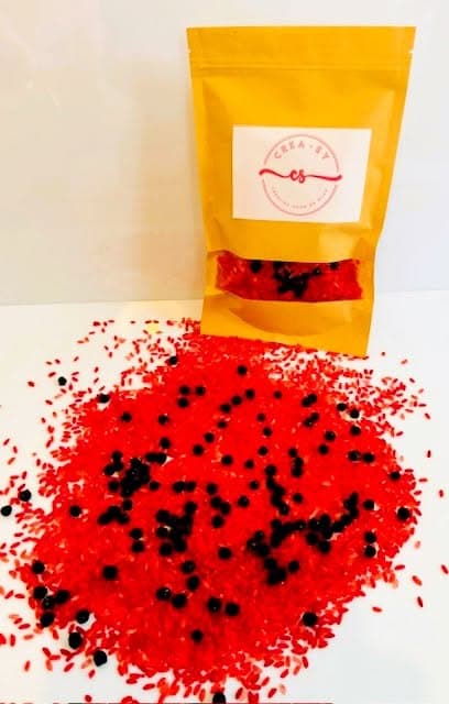 Speelrijst rood met zwarte bolletjes: lieveheersbeestje